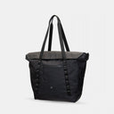 All-black waterproof tote for photographers and creatives. Converts from work to weekend mode.