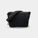 Compact travel sling bag for cameras, lenses, laptop, and accessories. Keeps gear organized and protected.